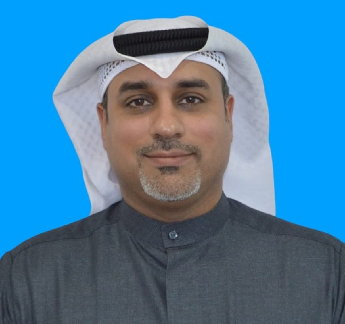 Professional portrait of Dr. Hassan Qasem, CEO and Board Member of AEPCo